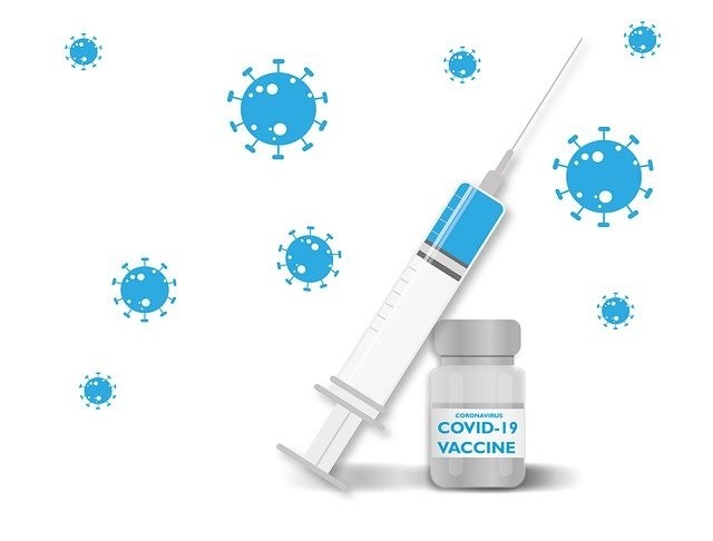 illustration du vaccin covid dans un flacon et une seringue